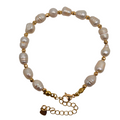 Embrace effortless elegance with this handcrafted pearl strand bracelet. Featuring luminous freshwater pearls delicately accented by minimalist gold bead spacers, this piece is 100% handcrafted in the Philippines by local artisans. Made with high-grade non-tarnish materials, it maintains its rich golden luster even through daily wear. Because natural freshwater pearls are used, every single piece is completely unique, carrying its own distinct shape, size, and luminous sheen.